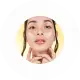 A circle with a profile photo of a woman